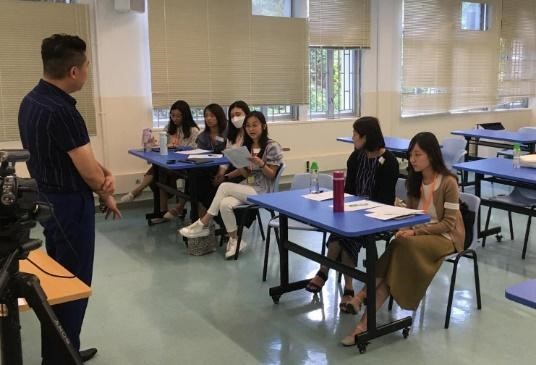 Figure 2. Teacher participants conducting professional dialogue during the Post-lesson observation conference 