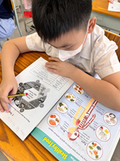 A student reads information and identifies key words    for telling the functions of different nutrients. He then reads and annotates    the text by circling the names of the nutrients and underlining their    functions.