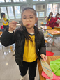 Students taste the ice cream to feel the    texture.